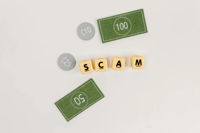 wooden scrabbles spelling scam on a white surface, by Joe Machine, private press, on grey background, scaly, product shot, bags of money