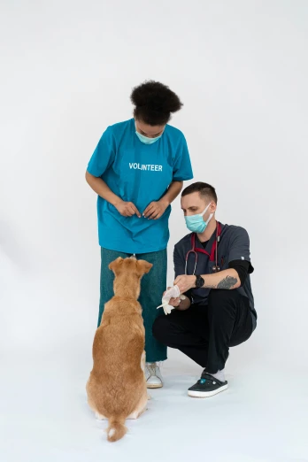 a man in a blue shirt is petting a brown dog, a picture, masked doctors, plain background, detailed »