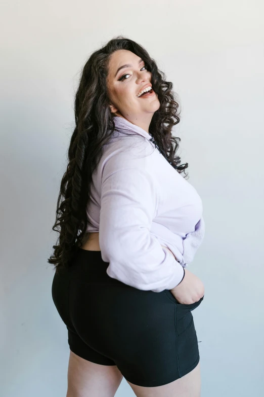 a woman in a short skirt posing for a picture, long curvy hair, thicc build, head bent back in laughter, profile image