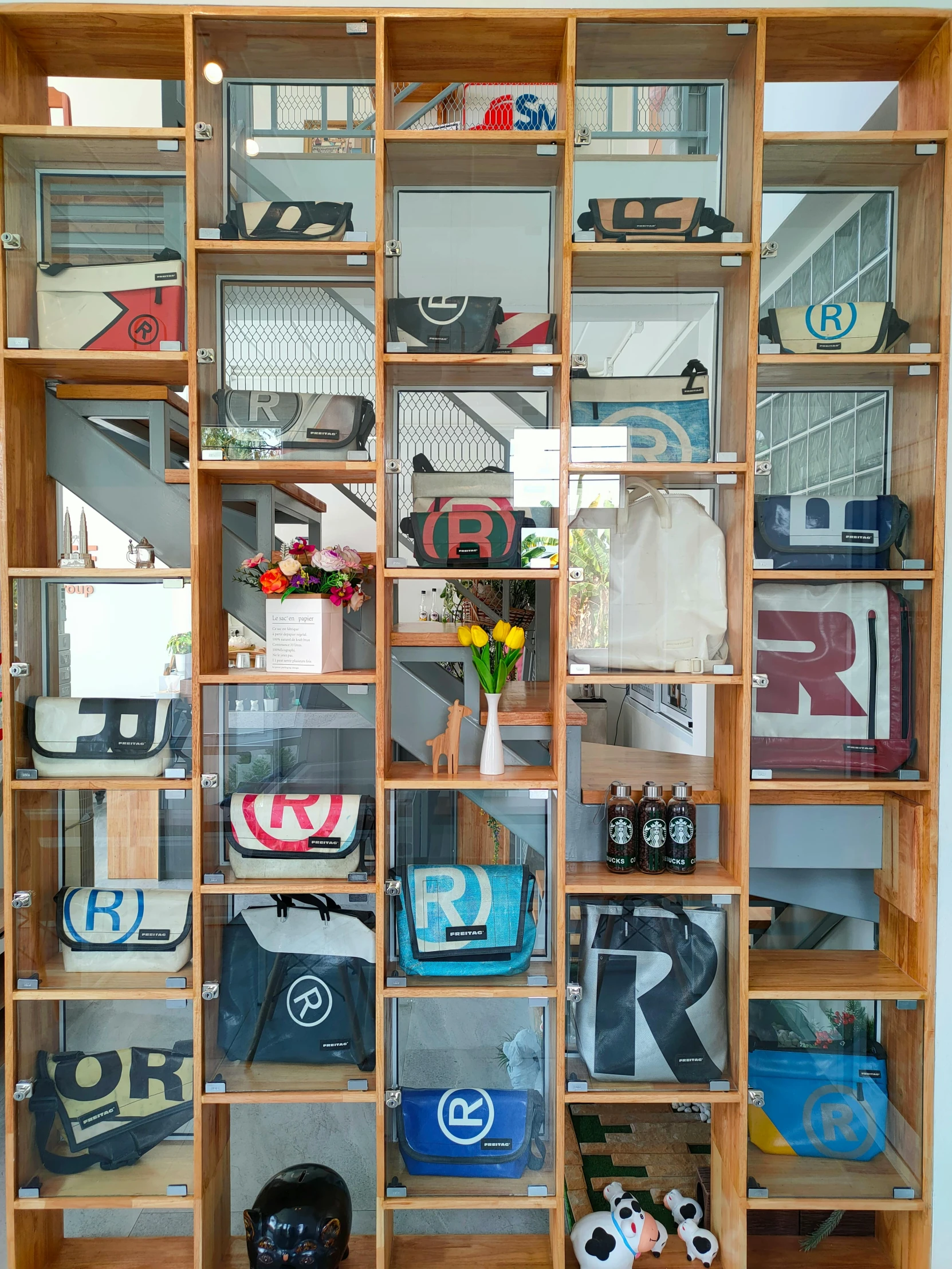 a display case filled with lots of different items, inspired by Conrad Marca-Relli, letterism, bags, restomod, 64x64, recycled