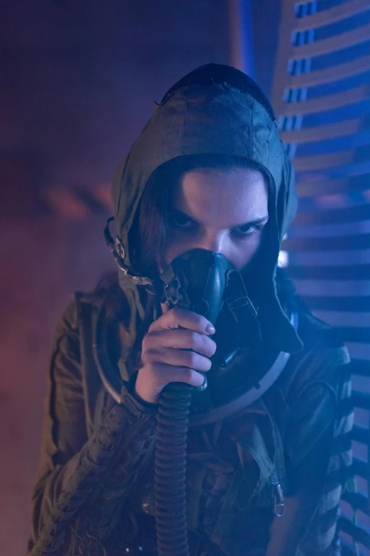 a man in a gas mask holding a phone, daisy ridley, an edgy teen assassin, tv show, vapour