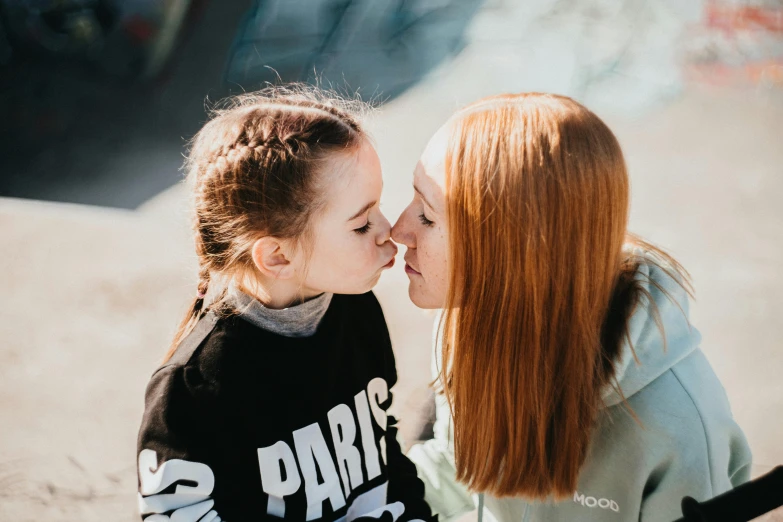 a couple of women standing next to each other, by Julia Pishtar, pexels contest winner, cute young redhead girl, kissing together cutely, your mom, 15081959 21121991 01012000 4k