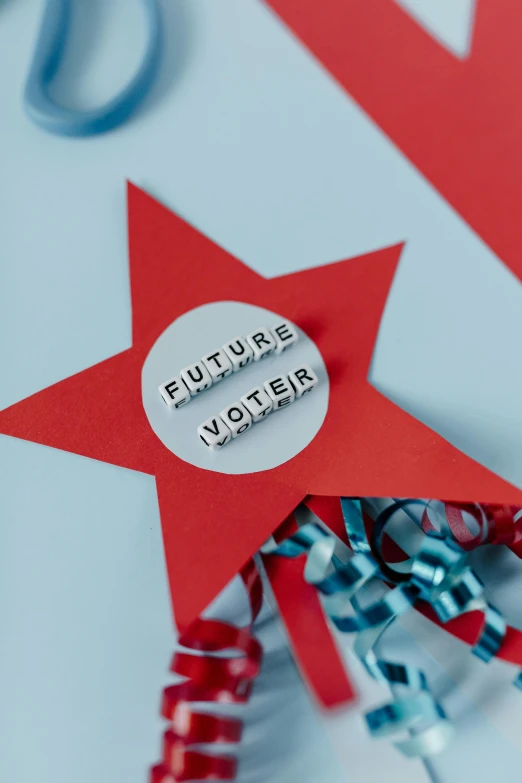 a pair of scissors sitting on top of a table, by Julia Pishtar, futurism, presidental elections candidates, vial of stars, detail shot, stickers