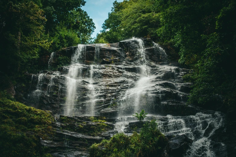 a waterfall in the middle of a forest, pexels contest winner, hurufiyya, fan favorite, shiny and sparkling, sri lankan landscape, thumbnail