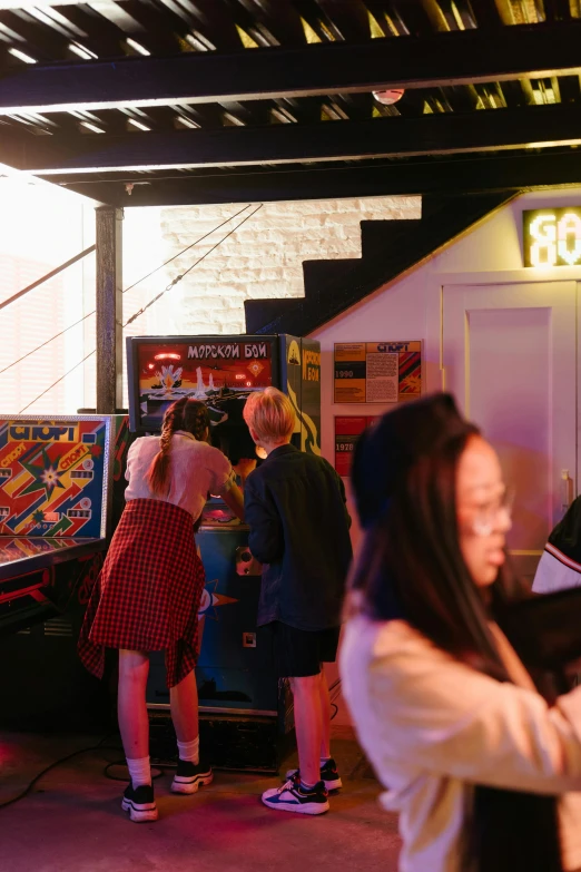 a group of people playing a game of pinball, happening, neon standup bar, zig zag, boiler room, girls