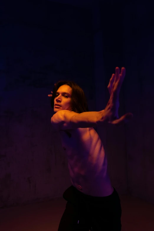 a man holding a tennis racquet on top of a tennis court, by Emily Mason, renaissance, contemporary dance, extremely moody purple lighting, frank dillane as a satyr, profile image