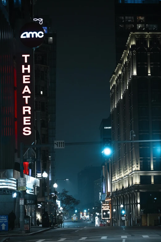 a city street lined with tall buildings at night, renaissance, theater, bright signage, foggy night, movies