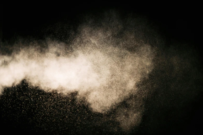 white powder flying in the air on a black background, a stipple, by Lucia Peka, pexels, sand mists, water is made of stardust, headshot, dusty floor