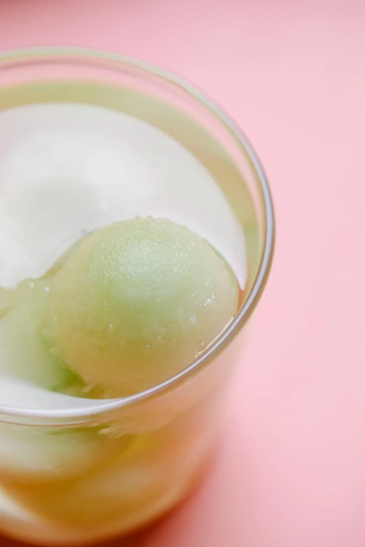 a close up of a glass of yogurt, by Doug Ohlson, renaissance, gradient pastel green, gumdrops, pickles, ice cubes