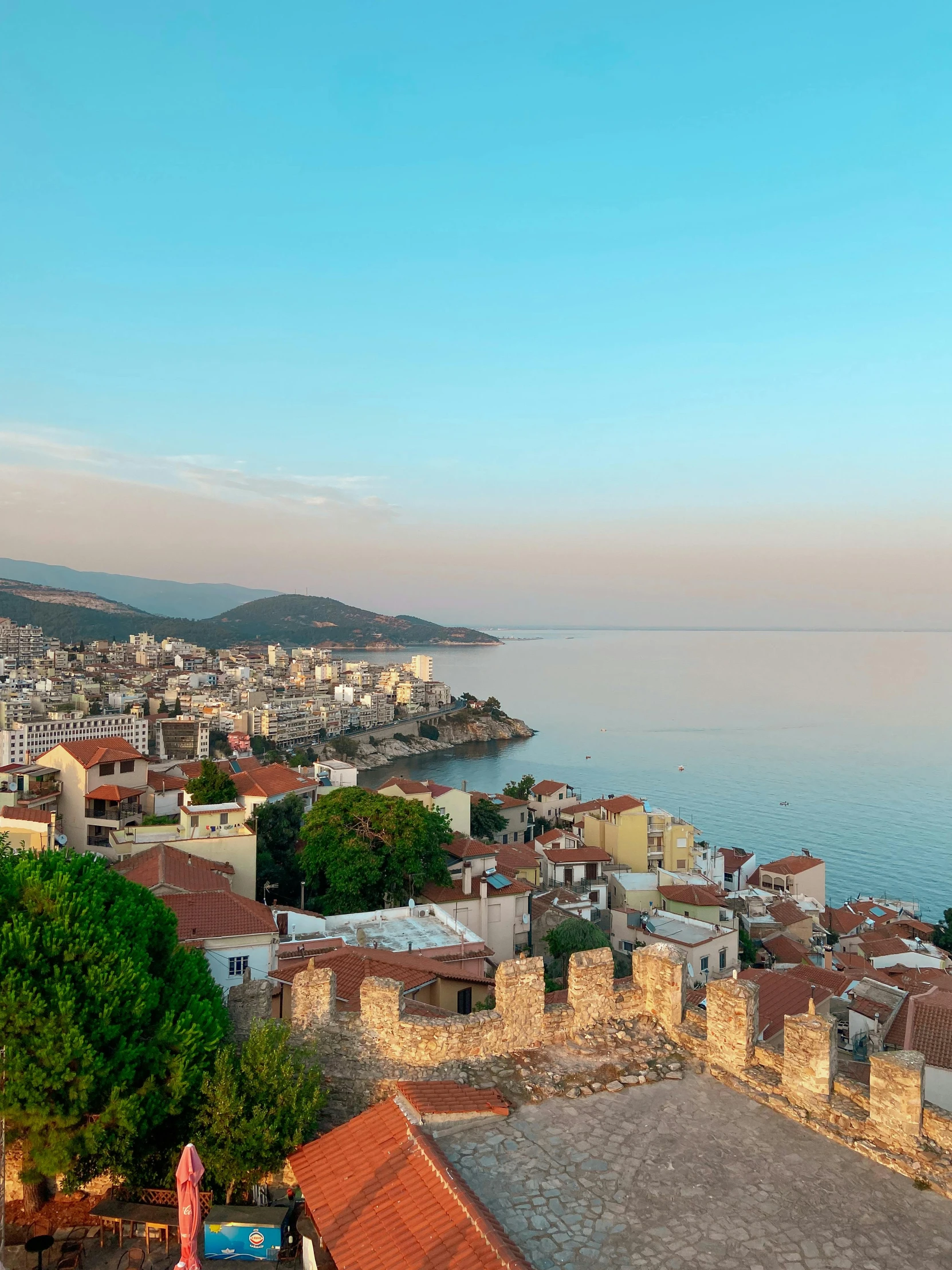 a view of a town next to a body of water, turkey, 8 k smooth, square, manly