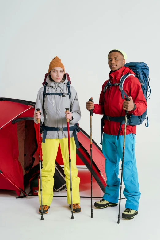 a couple of people standing next to a tent, red sport clothing, ad image, offwhite, nordic