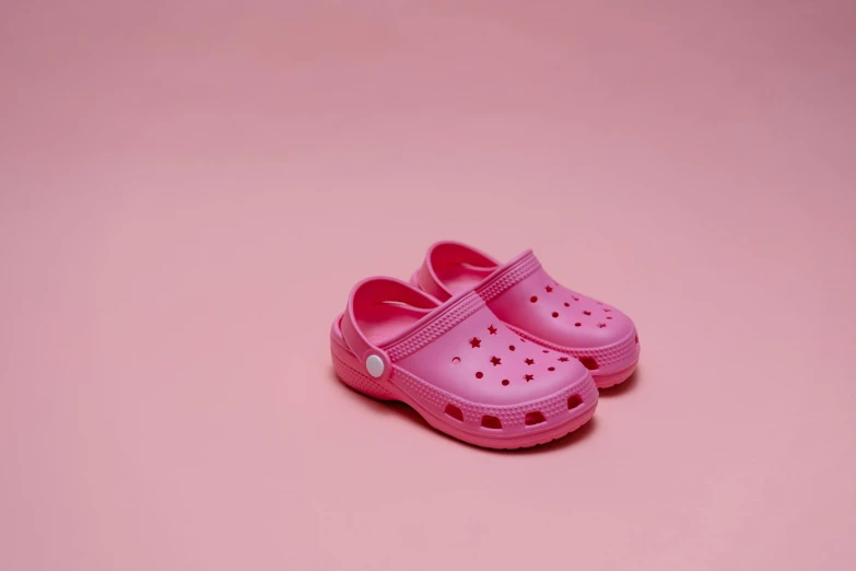 a pair of pink crocs on a pink background, by Juan O'Gorman, pexels, little kid, ((pink)), colour print, summer night