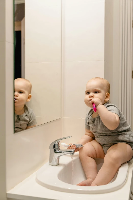 a baby sitting on a sink in front of a mirror, smaller mouth, profile image, extremely precise, ignant