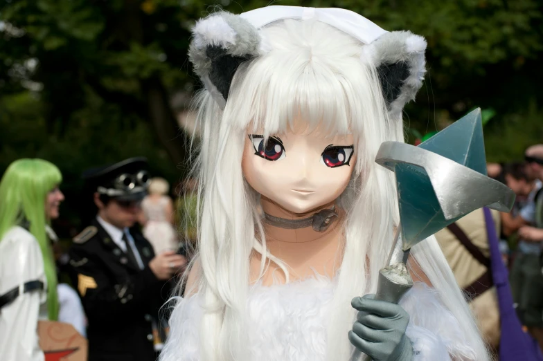 a close up of a person wearing a costume, inspired by Kanō Tan'yū, pixiv, furry art, white cat girl, the most advanced humanoid robot, journalism photo, nendroid