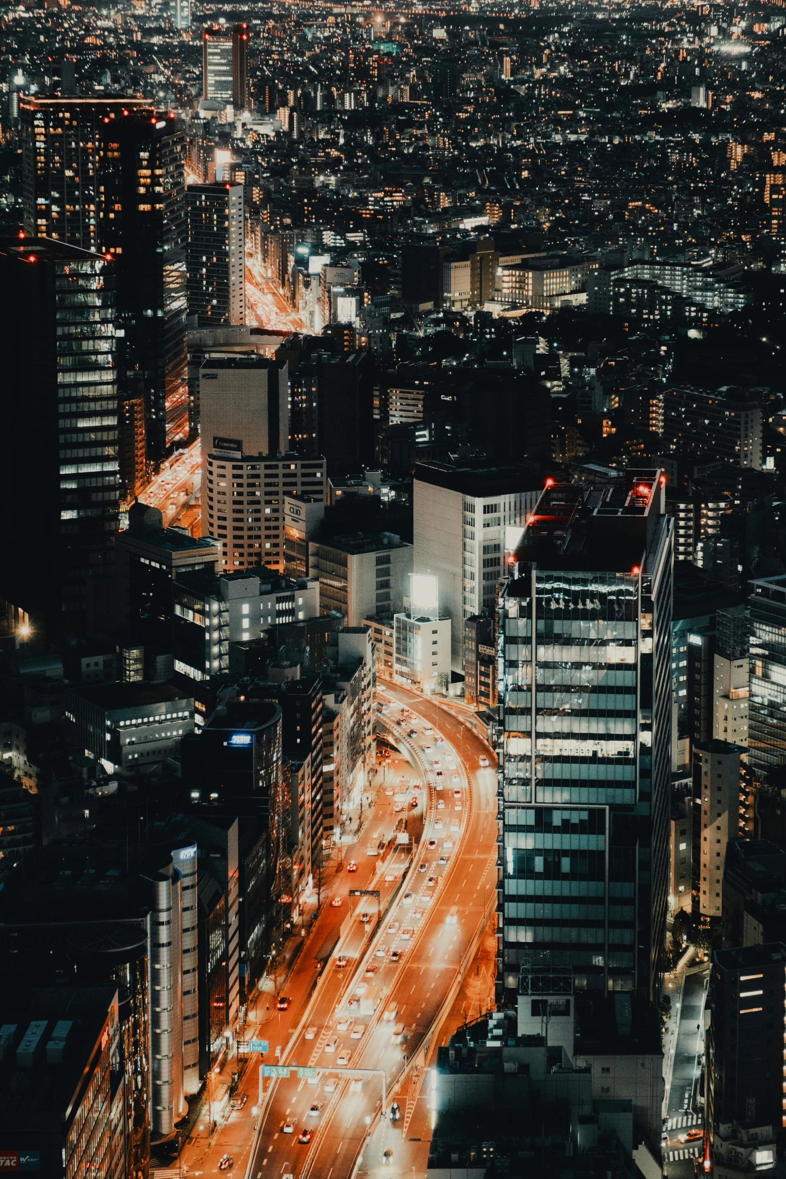 an aerial view of a city at night, pexels contest winner, trending in japan, high light on the left, stacked image, ilustration