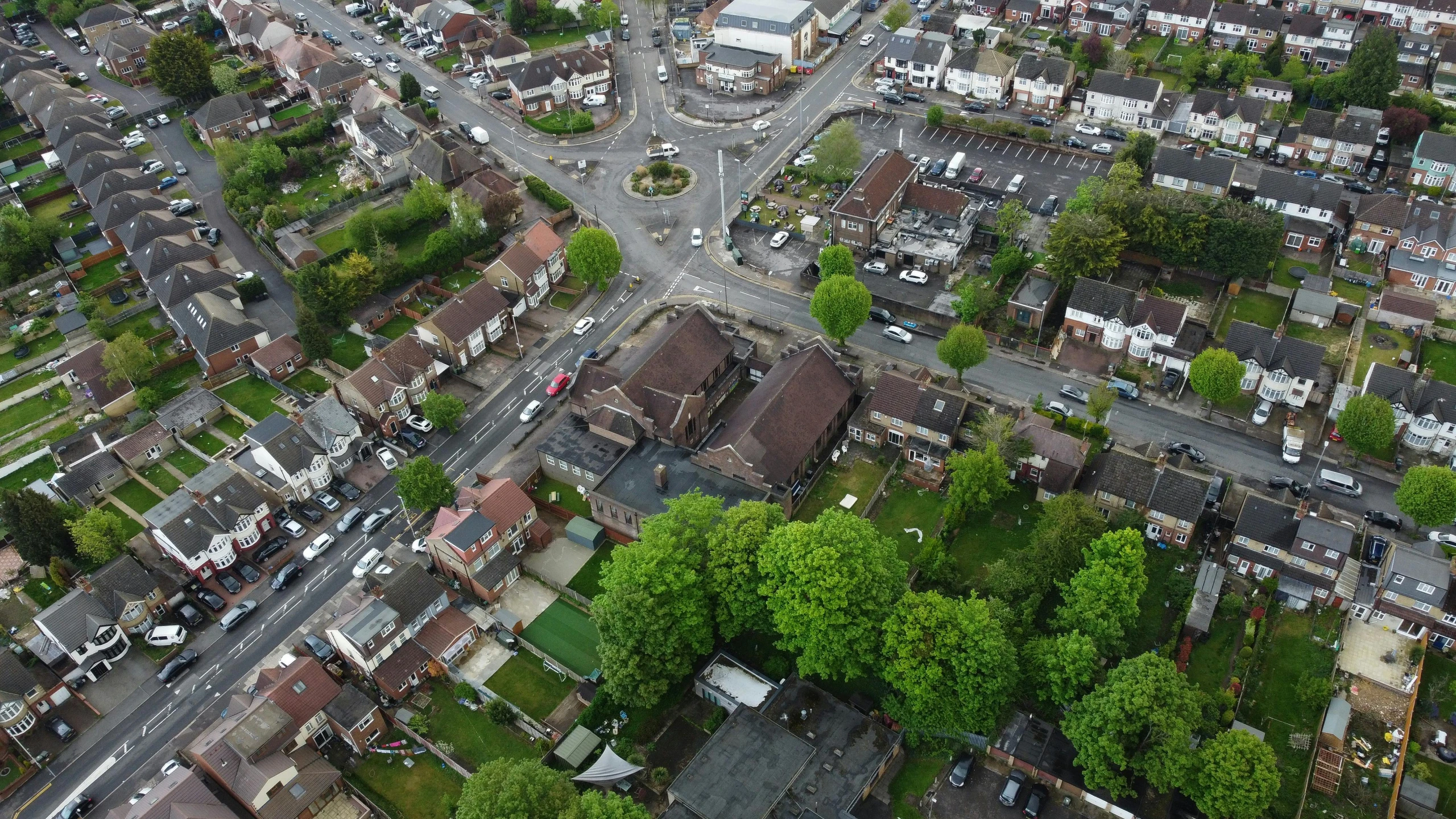 an aerial view of a city with lots of houses, an album cover, by Matthew Smith, unsplash, happening, mayfield parish, high polygon, hulton archives, churches