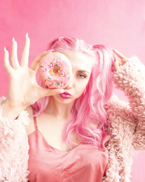 a woman with pink hair holding a doughnut in front of her face, trending on pexels, photoshoot for skincare brand, square, 🍸🍋, 🎀 🗡 🍓 🧚
