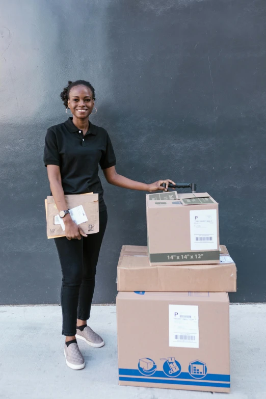 a woman standing next to a stack of boxes, avant designer uniform, african sybil, delivering mail, product introduction photos