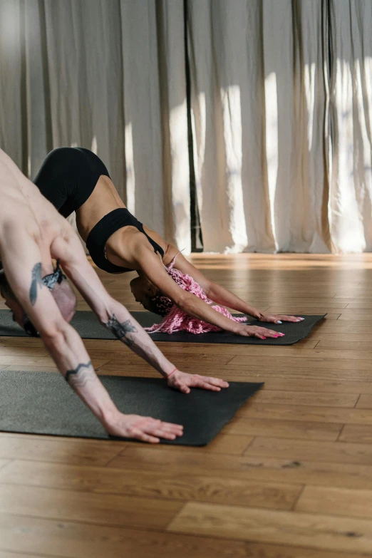 a group of people doing yoga in a room, unsplash, thumbnail, low detail, cottagecore!! fitness body, uploaded