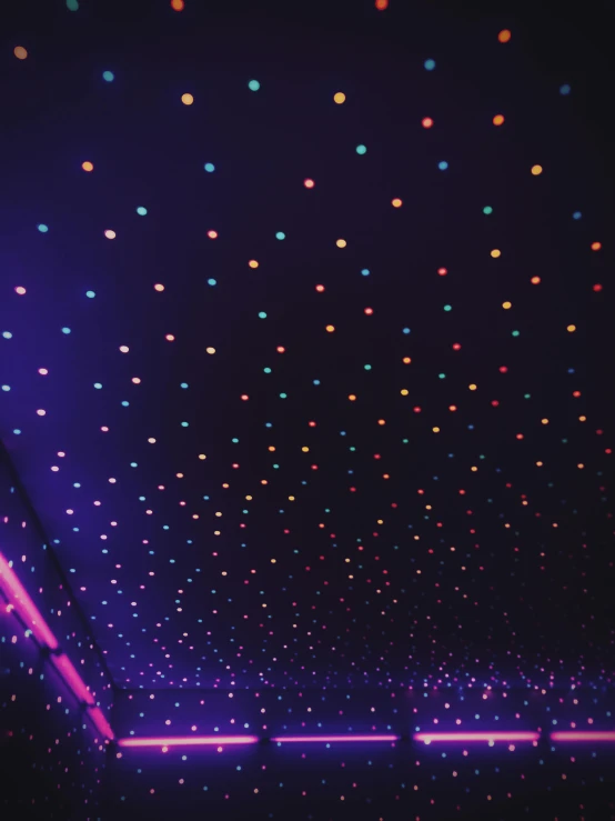 a room with a lot of lights on the ceiling, an album cover, inspired by Yahoo Kusama, unsplash contest winner, 🚀🌈🤩, car lights, colored lasers, trending on vsco