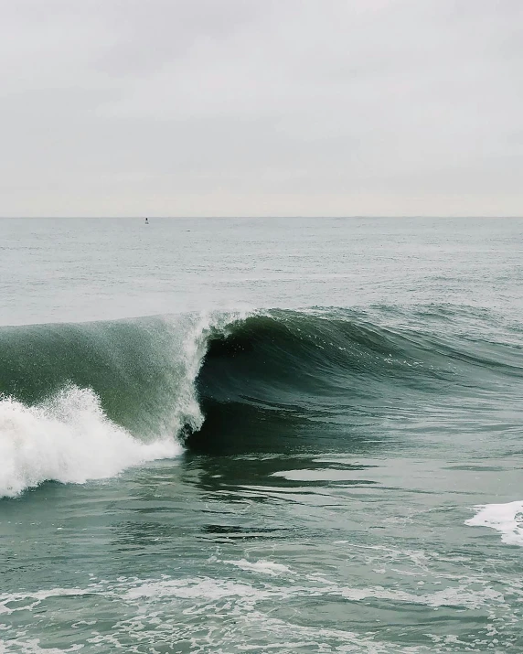 a man riding a wave on top of a surfboard, by Carey Morris, unsplash contest winner, renaissance, overcast day, full of greenish liquid, wall of water either side, photograph of san francisco