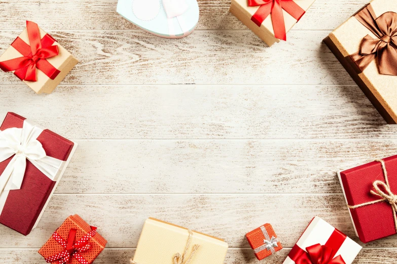 a wooden table topped with lots of presents, hurufiyya, background image, profile image, top angle view, square