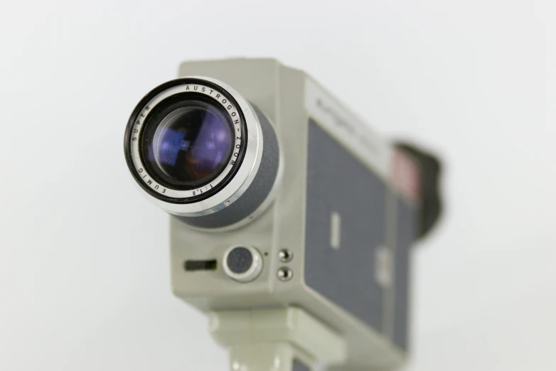 a close up of a camera on a tripod, vhs artefacts, ( dieter rams ), high quality product photo, photographic quality