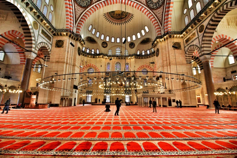 a large room filled with lots of red carpet, a colorized photo, by Ibrahim Kodra, pexels contest winner, hurufiyya, cybermosque interior, 2 5 6 x 2 5 6, fan favorite, istanbul