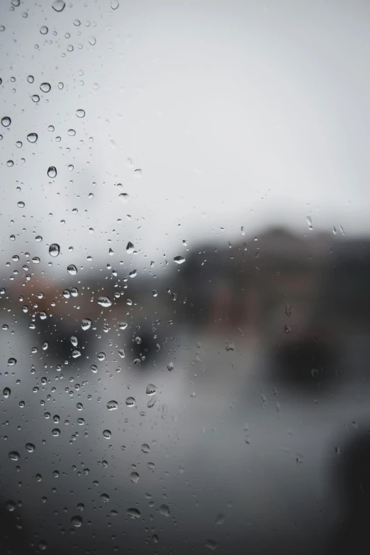 a close up of a window with raindrops on it, a picture, trending on unsplash, overcast gray skies, ilustration, outside in parking lot, wet reflections in square eyes