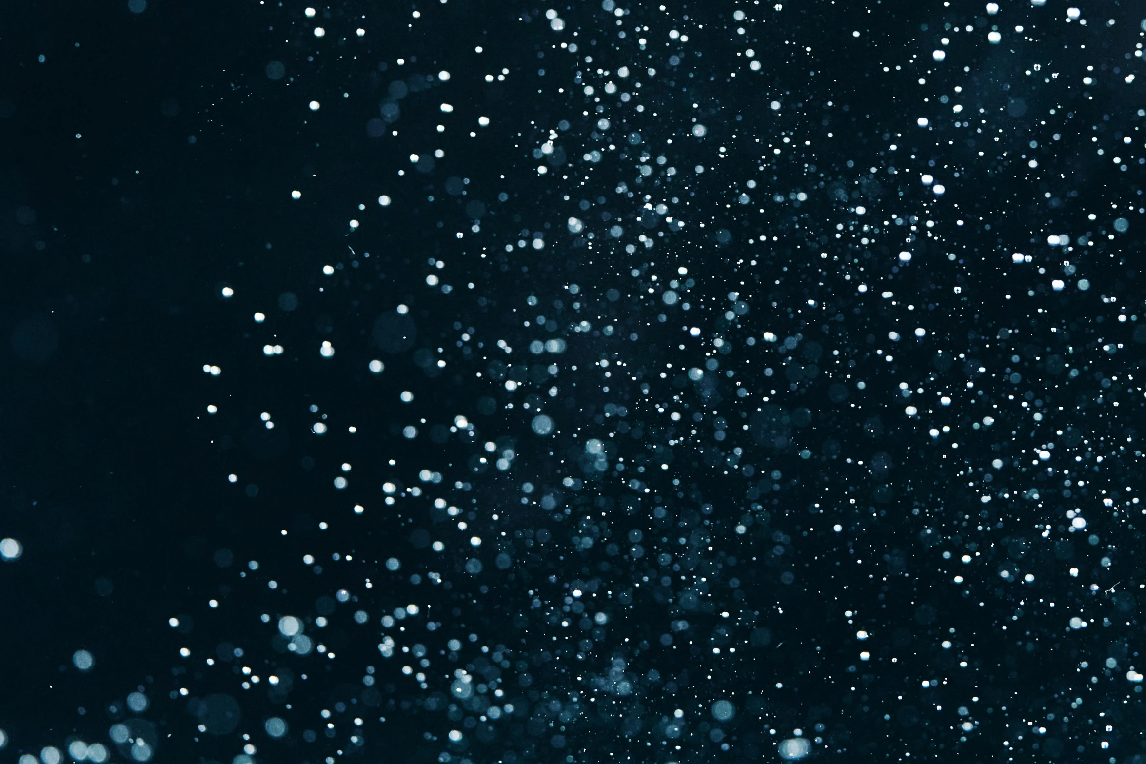 a bunch of bubbles floating in the air, by Niko Henrichon, pexels, digital art, snowfall at night, navy, background image, glistening skin