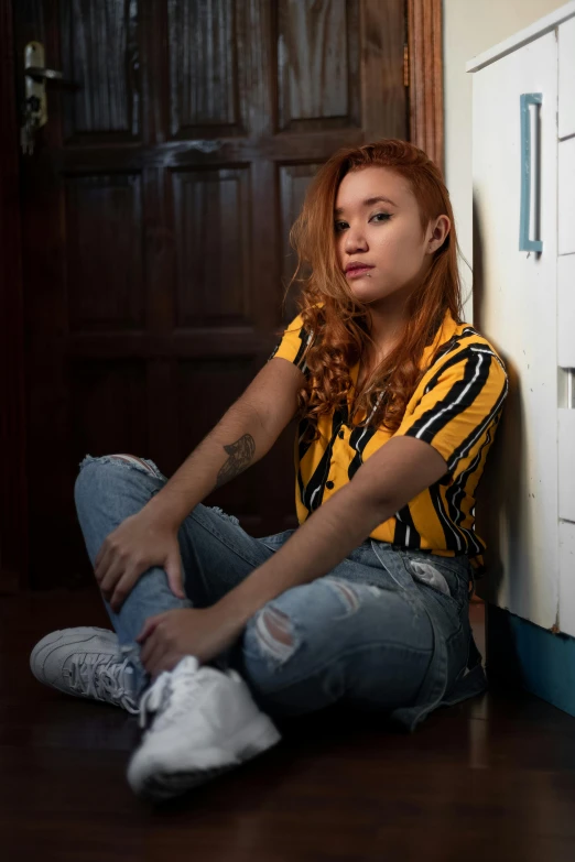 a woman sitting on the floor in front of a refrigerator, inspired by Elsa Bleda, trending on pexels, photorealism, red haired teen boy, with pop punk style, yellow and black, a young asian woman