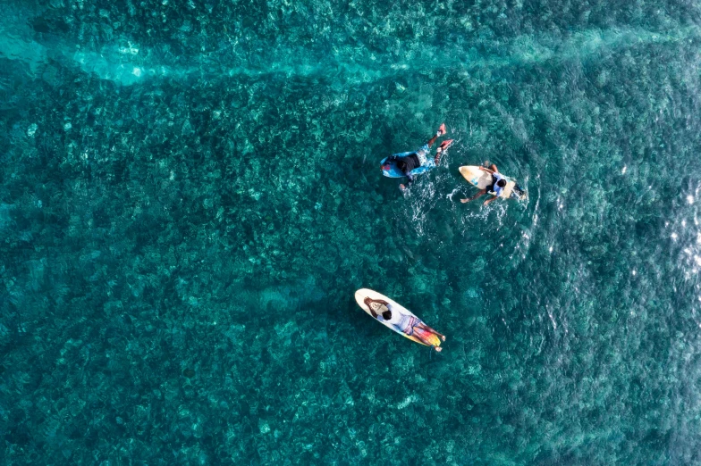 a couple of people that are in the water, pexels contest winner, aerial shot from the drone, dingy, hoverboards, thumbnail