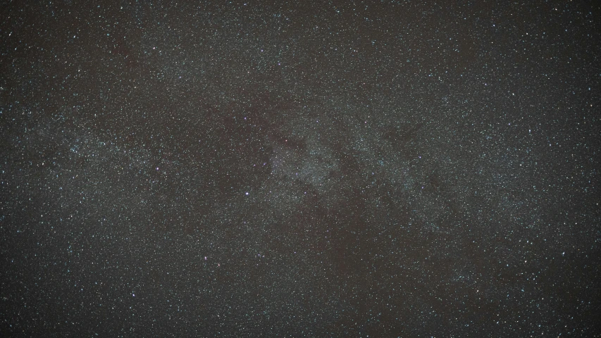 a dark sky filled with lots of stars, a microscopic photo, pexels, tonalism, detailed medium format photo, brown, 12mm wide-angle, dark