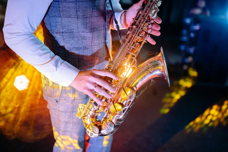 a close up of a person holding a saxophone, by Joe Bowler, pexels, art nouveau, nightclub, 15081959 21121991 01012000 4k, thumbnail, instagram post