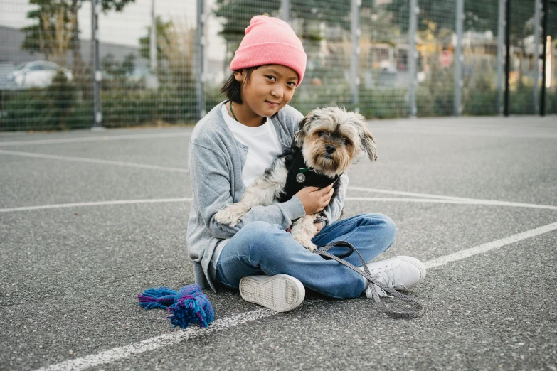 a little girl sitting on the ground with a dog, a portrait, pexels contest winner, at a skate park, portrait willow smith, nishimiya shouko, 15081959 21121991 01012000 4k