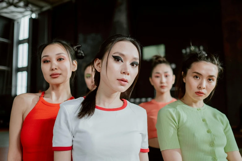 a group of women standing next to each other, inspired by Zhang Xiaogang, pexels contest winner, gutai group, avatar image, wearing a crop top, makeup, young asian girl