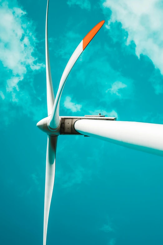 a close up of a wind turbine with a blue sky in the background, by Sven Erixson, pexels contest winner, on the ocean, deep green, 256435456k film, thumbnail