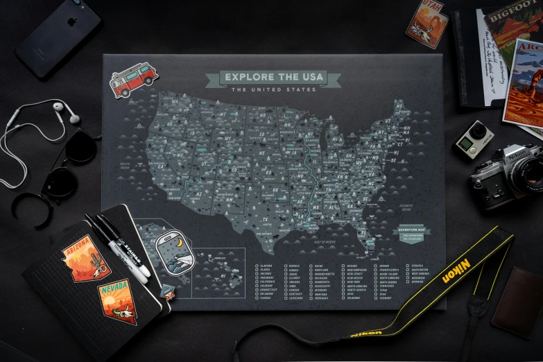 a map of the united states on a table, a cartoon, graffiti, dark grey and orange colours, wide angle lens glow in the dark, trapper keeper, on dark paper