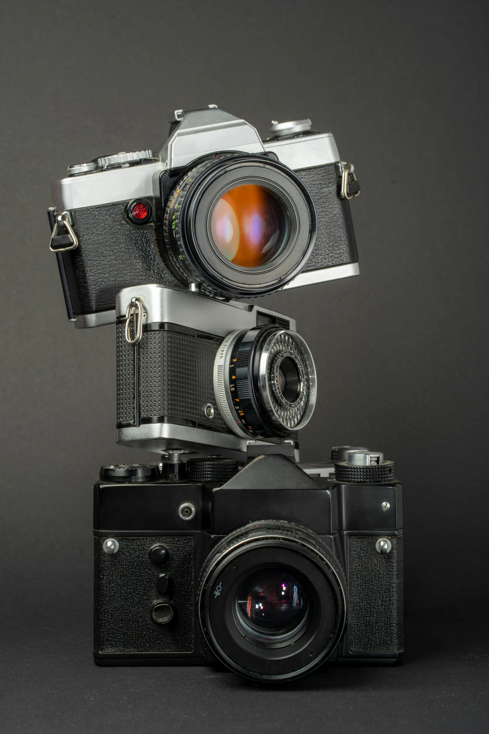 a couple of cameras sitting on top of each other, a portrait, by Sven Erixson, scientific photography, large format, detailed medium format photo