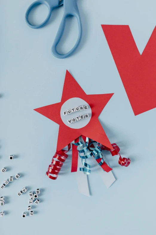 a pair of scissors sitting on top of a table, by Julia Pishtar, process art, patriotic, tactile buttons and lights, popstar comeback single, close-up product photo