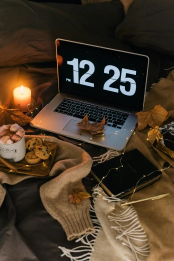 a laptop computer sitting on top of a bed, a still life, by Julia Pishtar, trending on pexels, new years eve, small clocks as leaves, dessert, candlelit