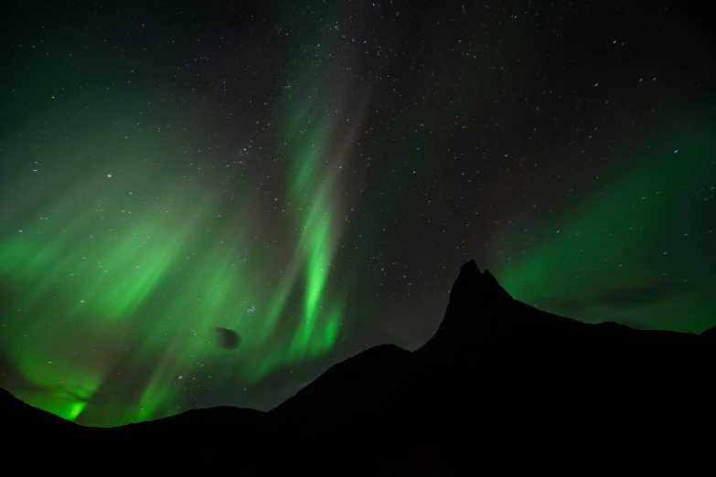 the aurora lights in the sky above a mountain range, by Julia Pishtar, pexels contest winner, hurufiyya, black, peaks, ammolite, nordic crown