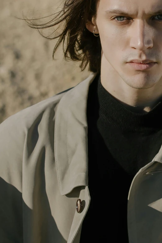 a close up of a person wearing a jacket, trending on pexels, mid long hair, adam ondra, high-body detail, high collar