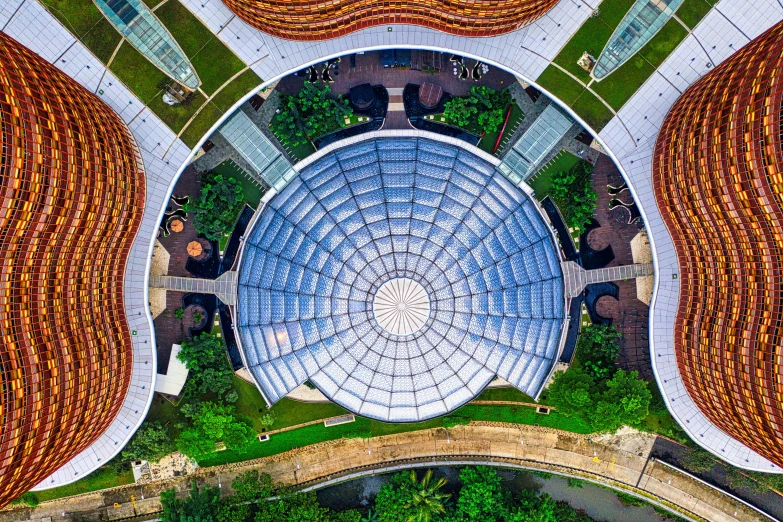 an overhead view of the roof of a building, a digital rendering, by Jan Rustem, pexels contest winner, botanic garden, kuala lumpur, circular face, panoramic shot