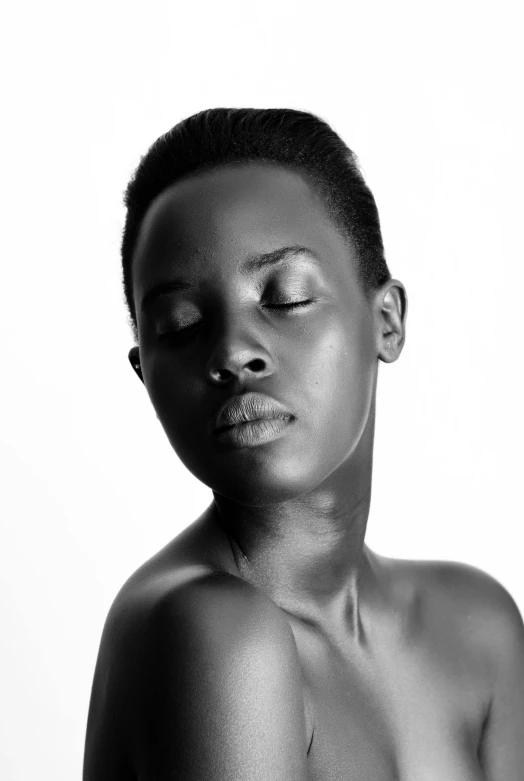 a black and white photo of a woman with her eyes closed, by Clifford Ross, unsplash, hyperrealism, lupita nyong'o, clean shaven!!!!