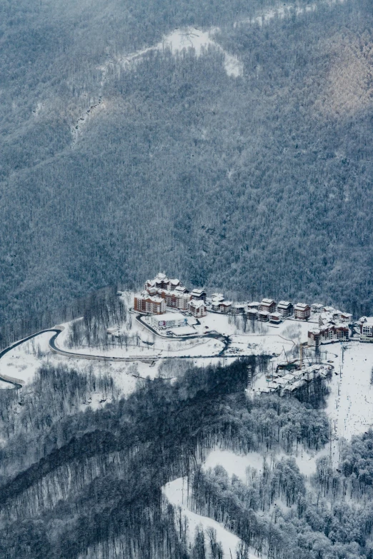 an aerial view of a ski resort in the mountains, inspired by Peter Zumthor, renaissance, bhutan, trending photo, greece, mint