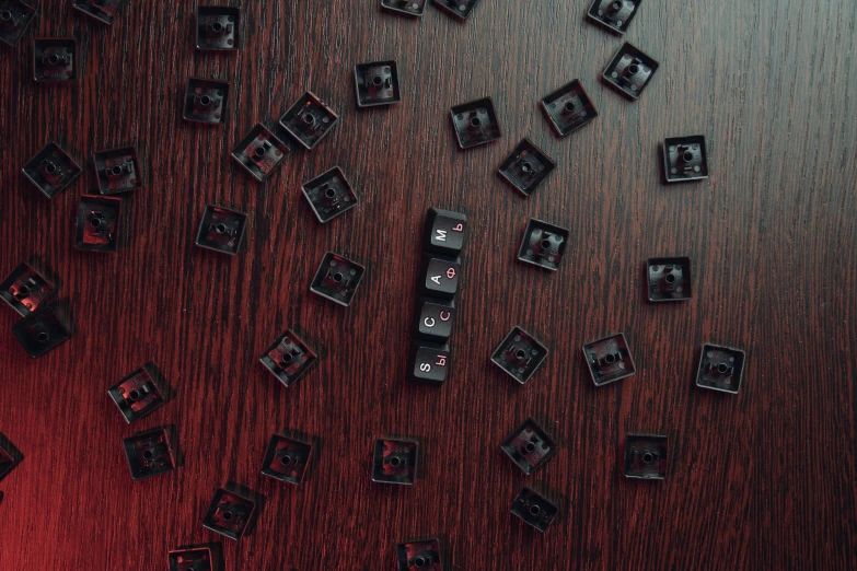 a clock sitting on top of a wooden table, an album cover, by Adam Marczyński, unsplash, lots of dices everywere, black-crimson color scheme, rows of doors, computer chips