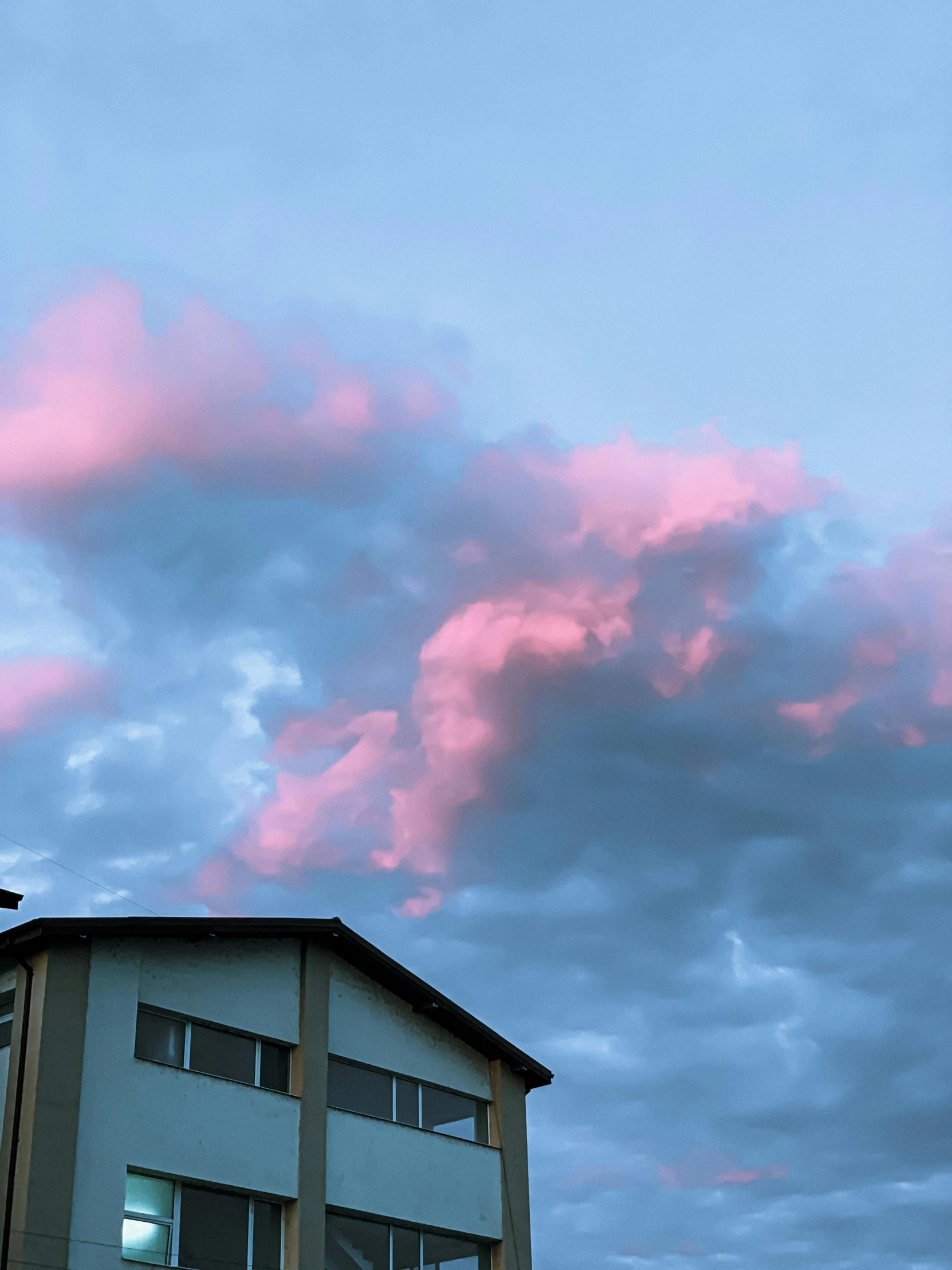 a clock tower on top of a building under a cloudy sky, an album cover, by Alexis Grimou, unsplash, aestheticism, made of cotton candy, ☁🌪🌙👩🏾, late summer evening, cloud day