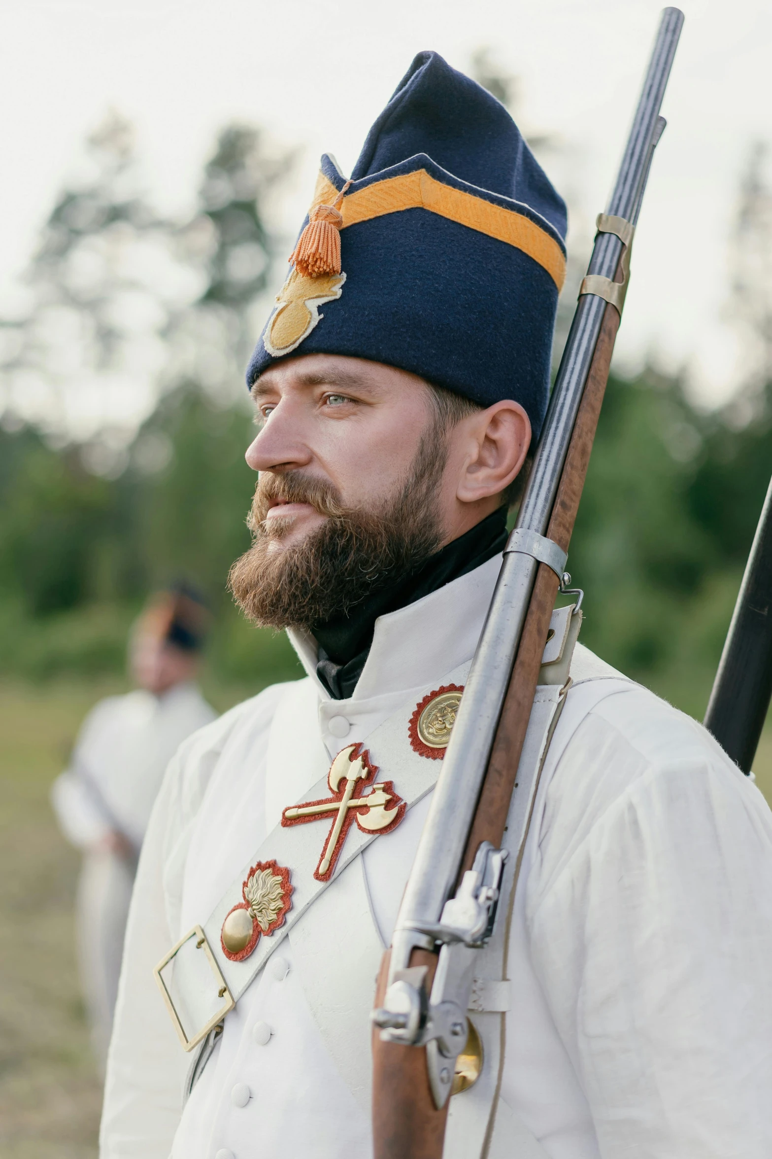 a man in a military uniform holding a rifle, a colorized photo, inspired by Carl Gustaf Pilo, unsplash, renaissance, white russian clothes, profile image, stålenhag, swedish style