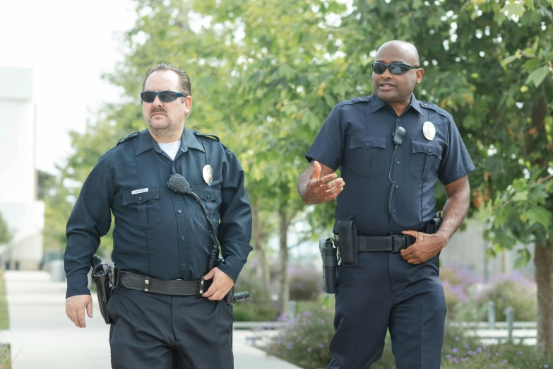 two police officers standing next to each other, shutterstock, happening, avatar image, college, california, 15081959 21121991 01012000 4k